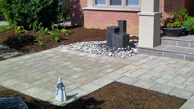 Completed natural stone and interlock patio project