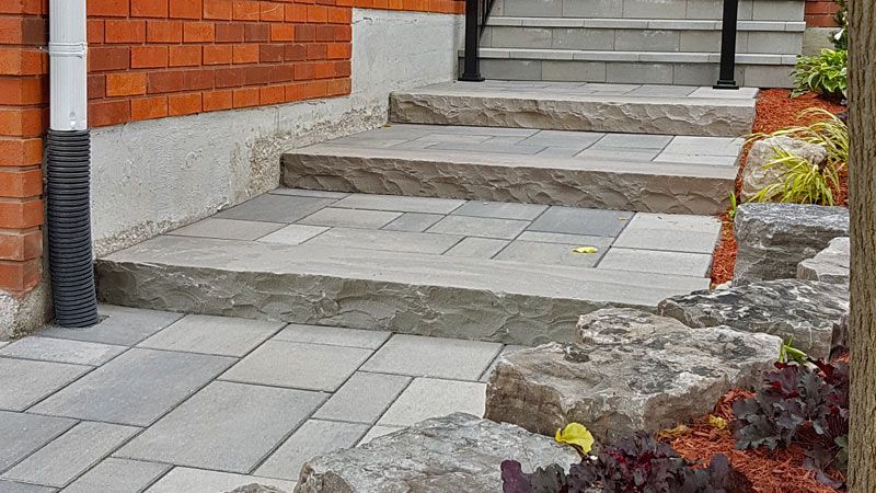 Completed natural stone and interlock step project