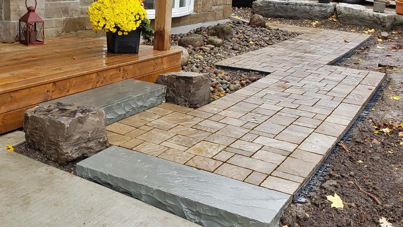 Completed natural stone and interlock walkway project