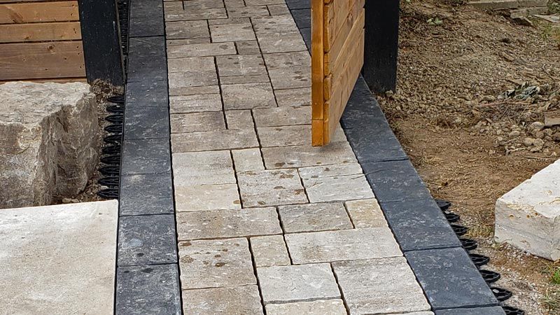 Completed natural stone and interlock walkway project