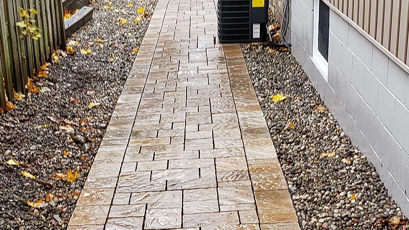 Completed natural stone and interlock walkway project