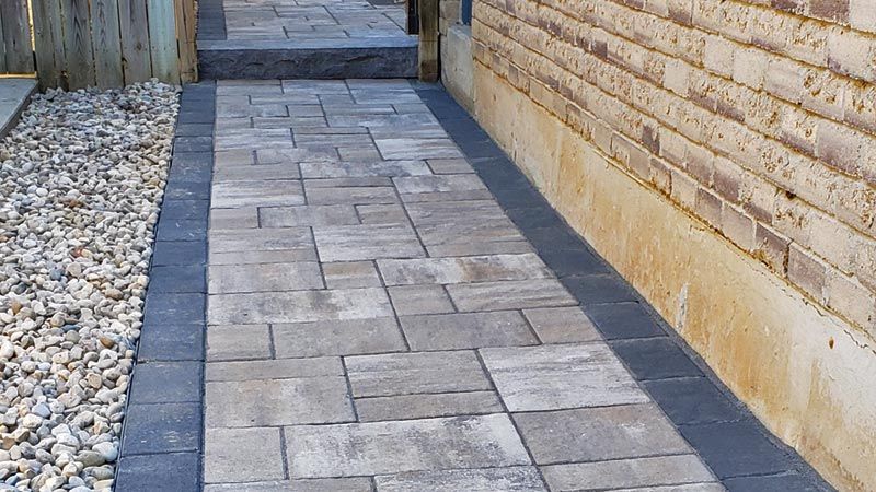 Completed natural stone and interlock walkway project