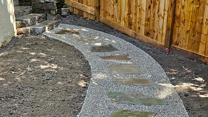 Completed natural stone and interlock walkway project