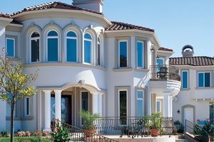Two-story residential home with many windows in Victorville, CA