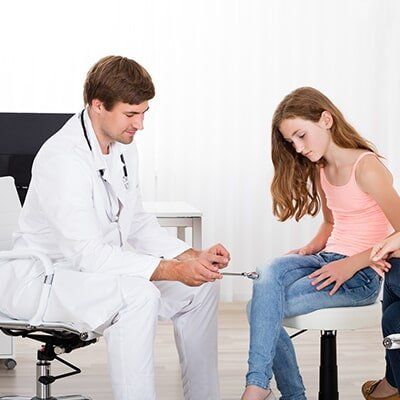 Doctor Checking The Girl — Neurologists in St. Petersburg, FL