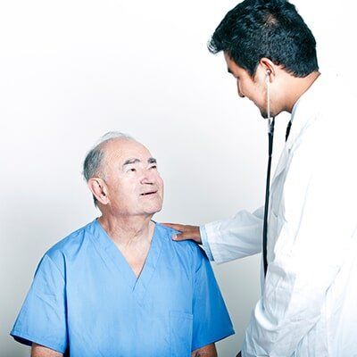 Doctor Checking His Senior Patient — Neurologists in St. Petersburg, FL