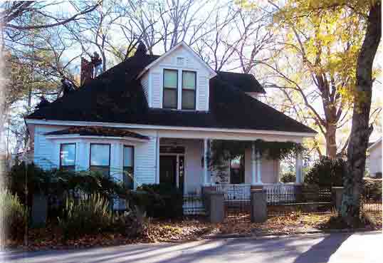 House with Black Roof — Decatur, AL — Guaranty Roofing
