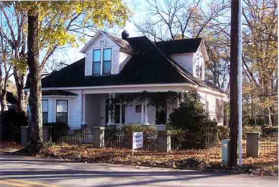 Side View of House with Black Roof — Decatur, AL — Guaranty Roofing