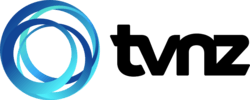 A tvnz logo with a blue circle in the middle