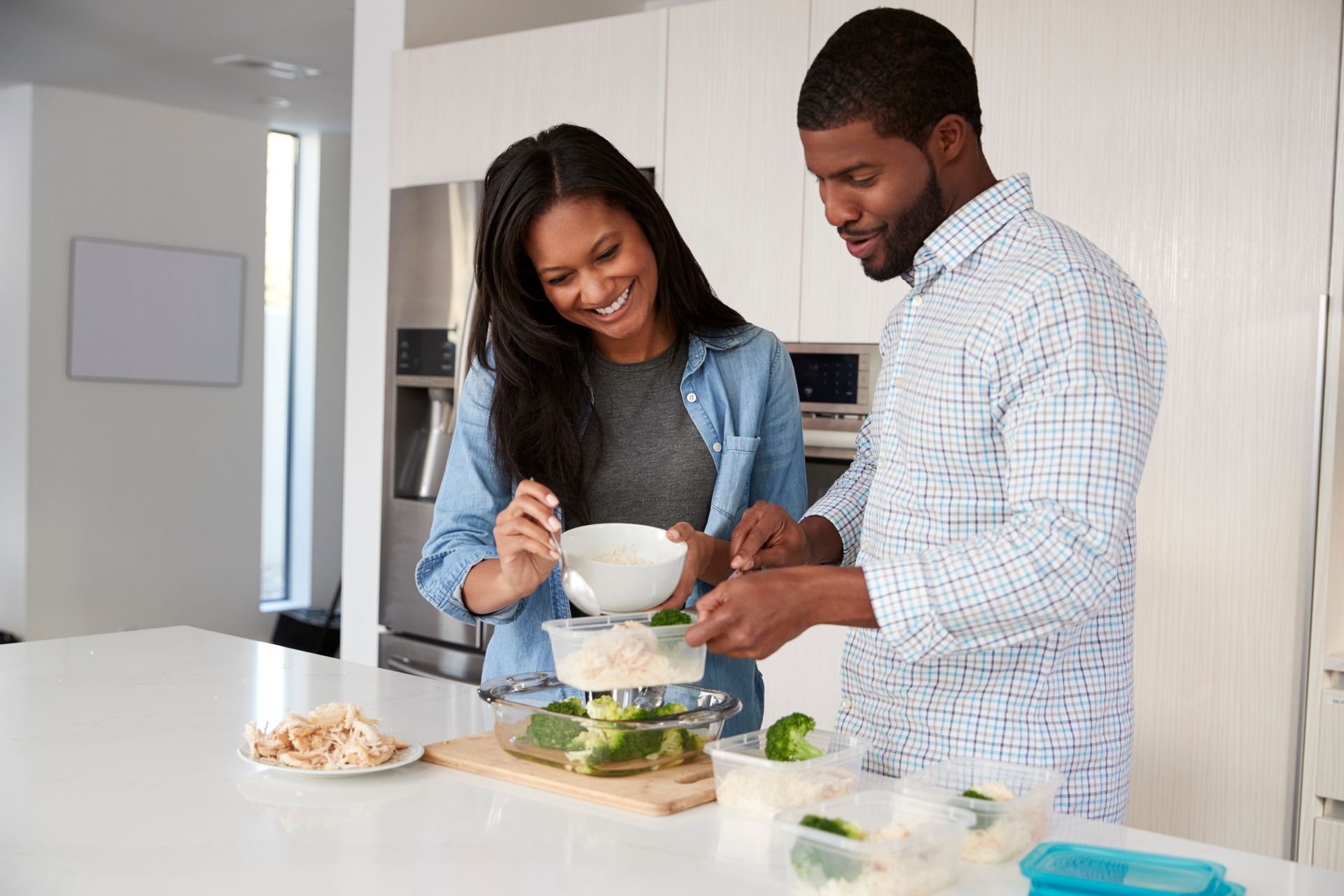 the man and his wife making food together for male fertility 