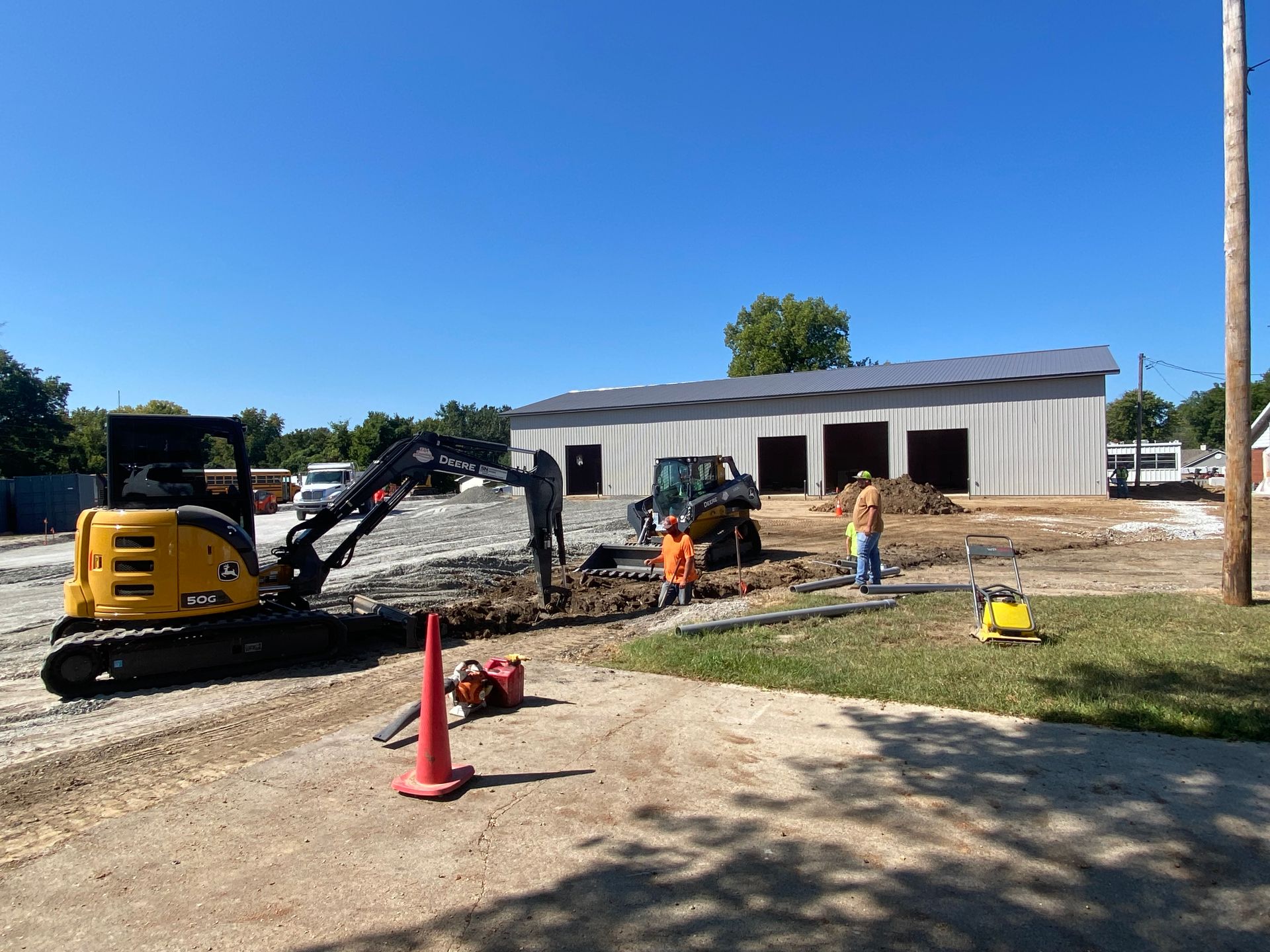A group of construction workers are working on a construction site.