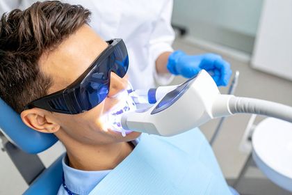 A man is getting dental whitening in Meridian, ID