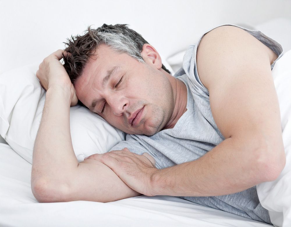 Man sleeping in bed in Meridian, ID