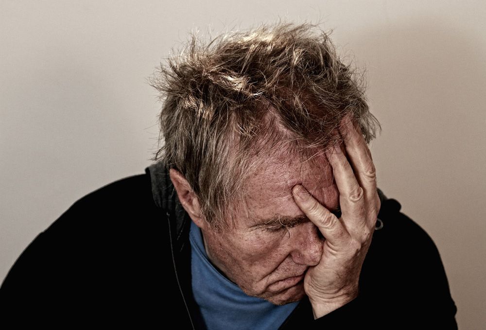 Elderly man having morning headache in Meridian, ID