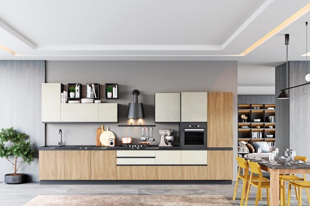 Cucina moderna con mobili in legno e crema, elettrodomestici in acciaio inossidabile e zona pranzo.