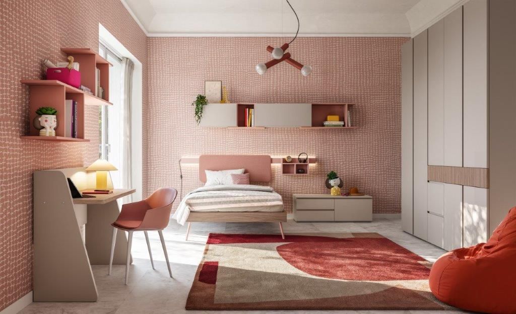 Camera da letto rosa con letto, scrivania, scaffali e armadio. 