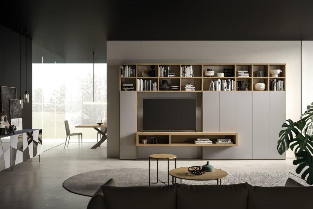 Soggiorno moderno con centro multimediale integrato, colori neutri e luce naturale.