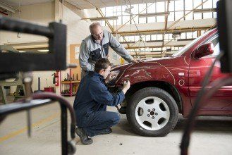 Mechanics — Checking Damaged Automobile in Hyannis, MA