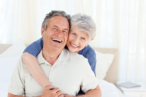 Man and Woman with Smiling Face — Santa Cruz, CA — Dan Casagrande - Reverse Mortgages