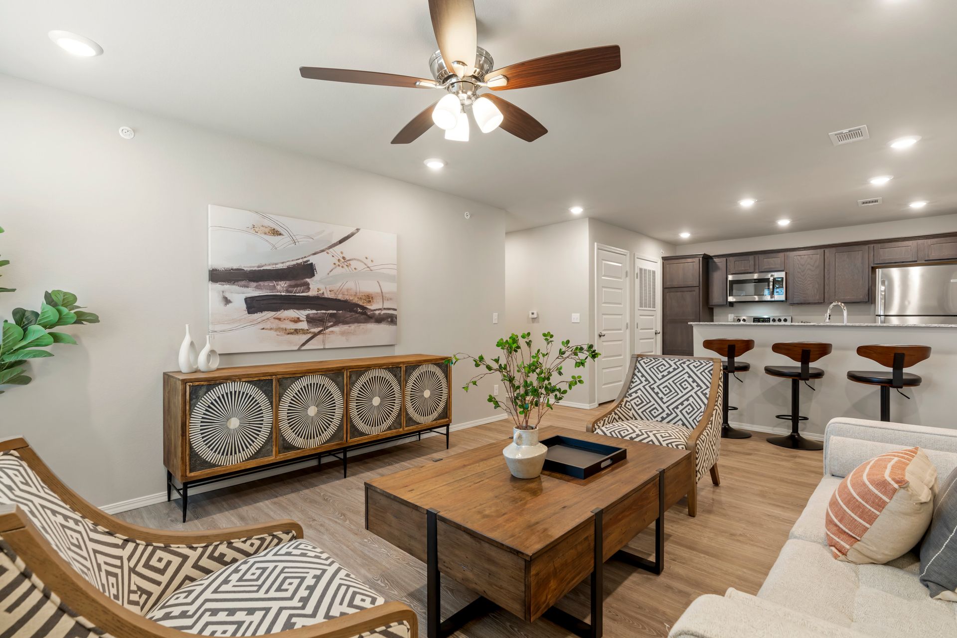 The Reserve at Springdale-furnished living room with celling fan