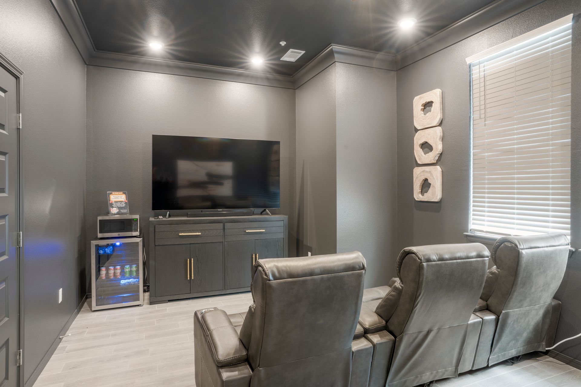 The Reserve at Springdale - Movie Theater chairs and large tv