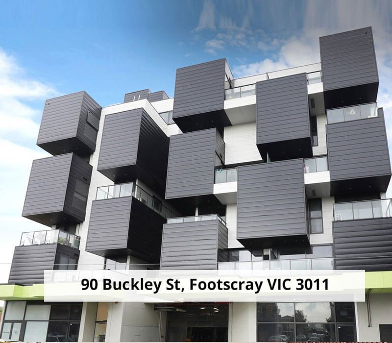 A large building with a sign that says 90 buckley st. footscray vic 3011