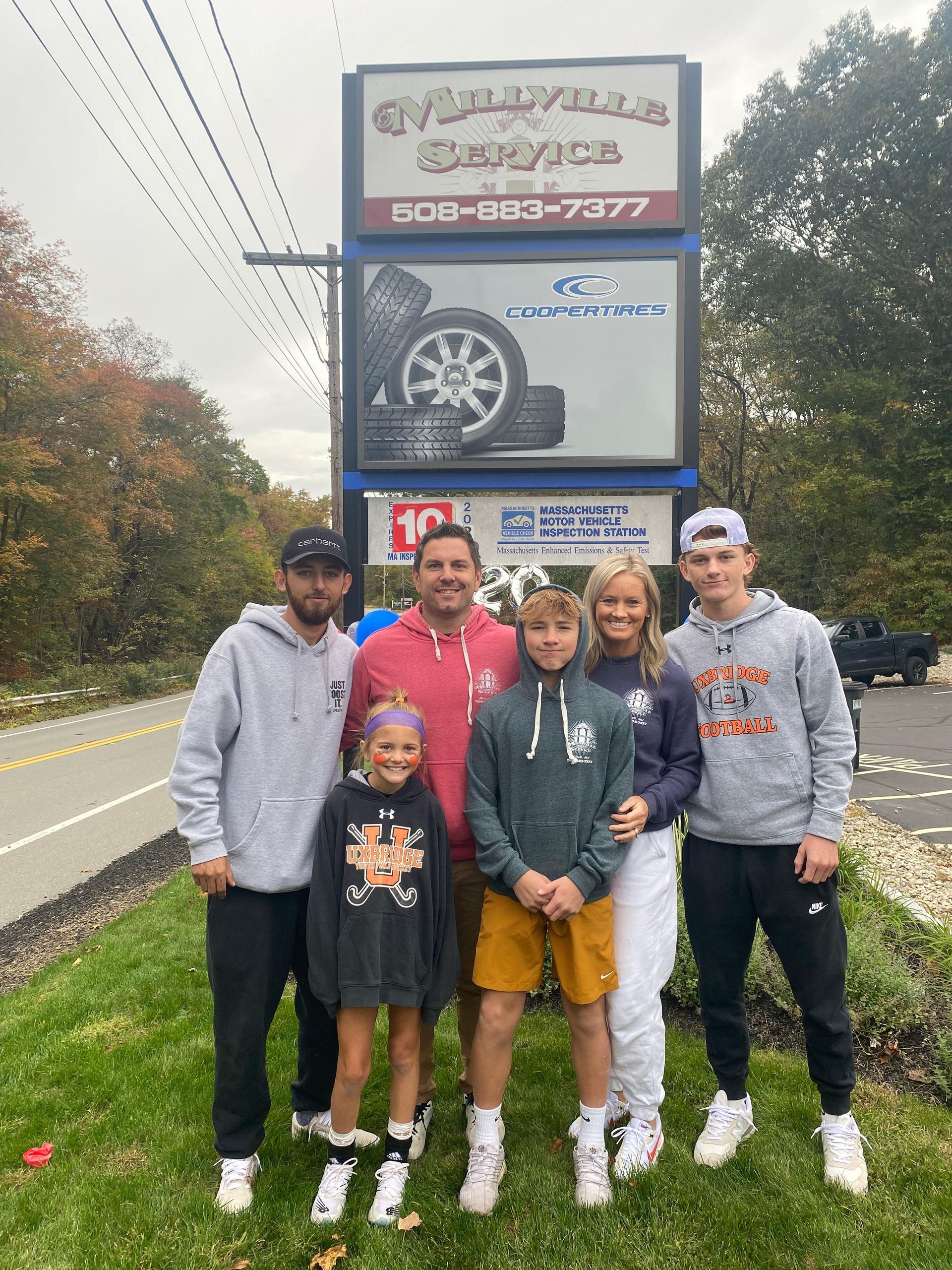 Family And Staff Group Photo Outside Millville Service | Millville Service