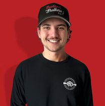Man in black hat and shirt with 