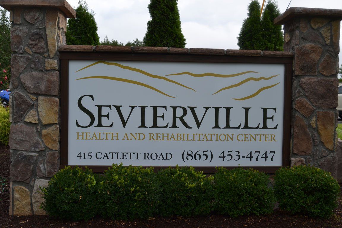 A sign for sevierville health and rehabilitation center