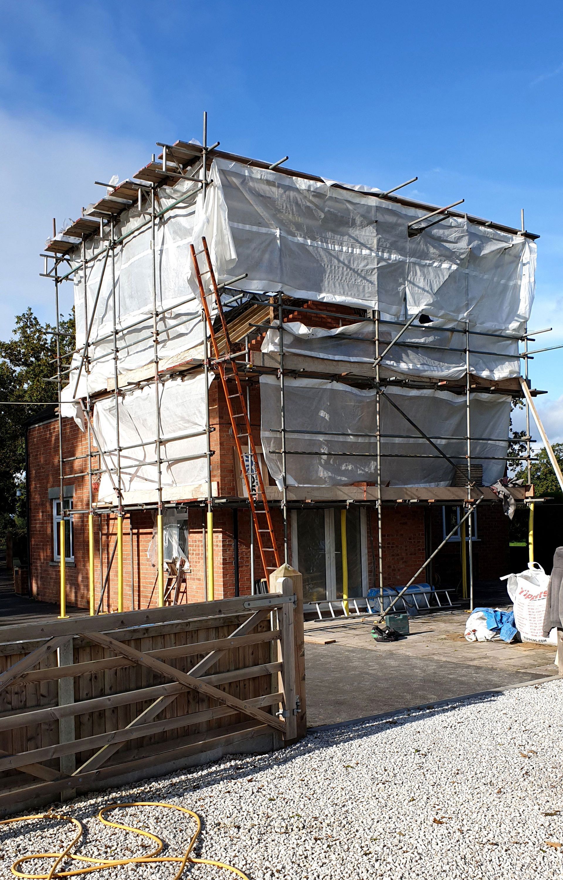 Protective tented scaffolding