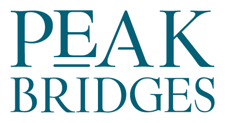 The logo for peak bridges is blue and white on a white background.