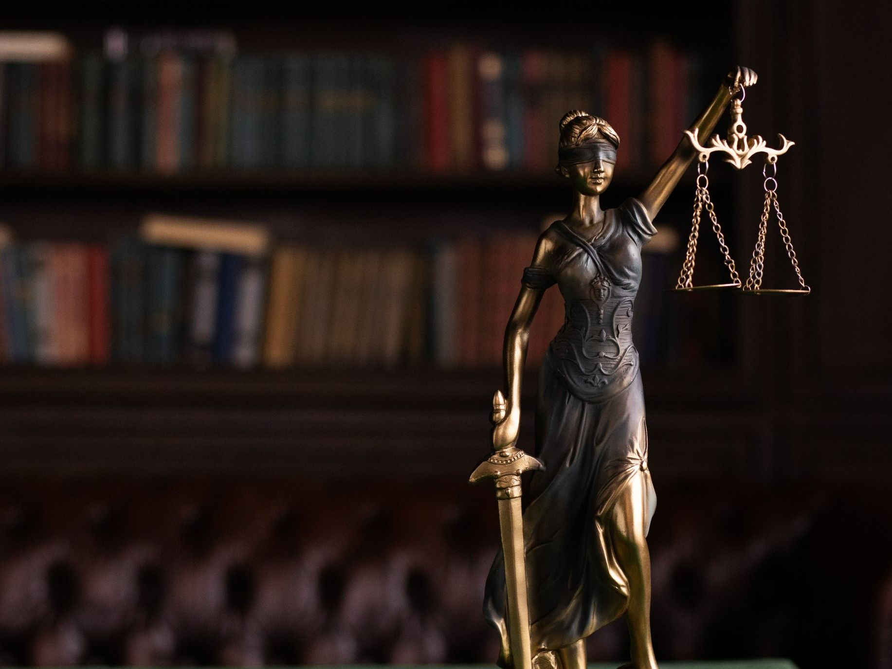 close up of a gold and black statue