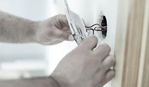 Professional Electrician — Fixing Electrical Switch in Mt. Holly, NJ