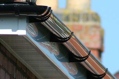 A close up of a good gutter for a healthy roof