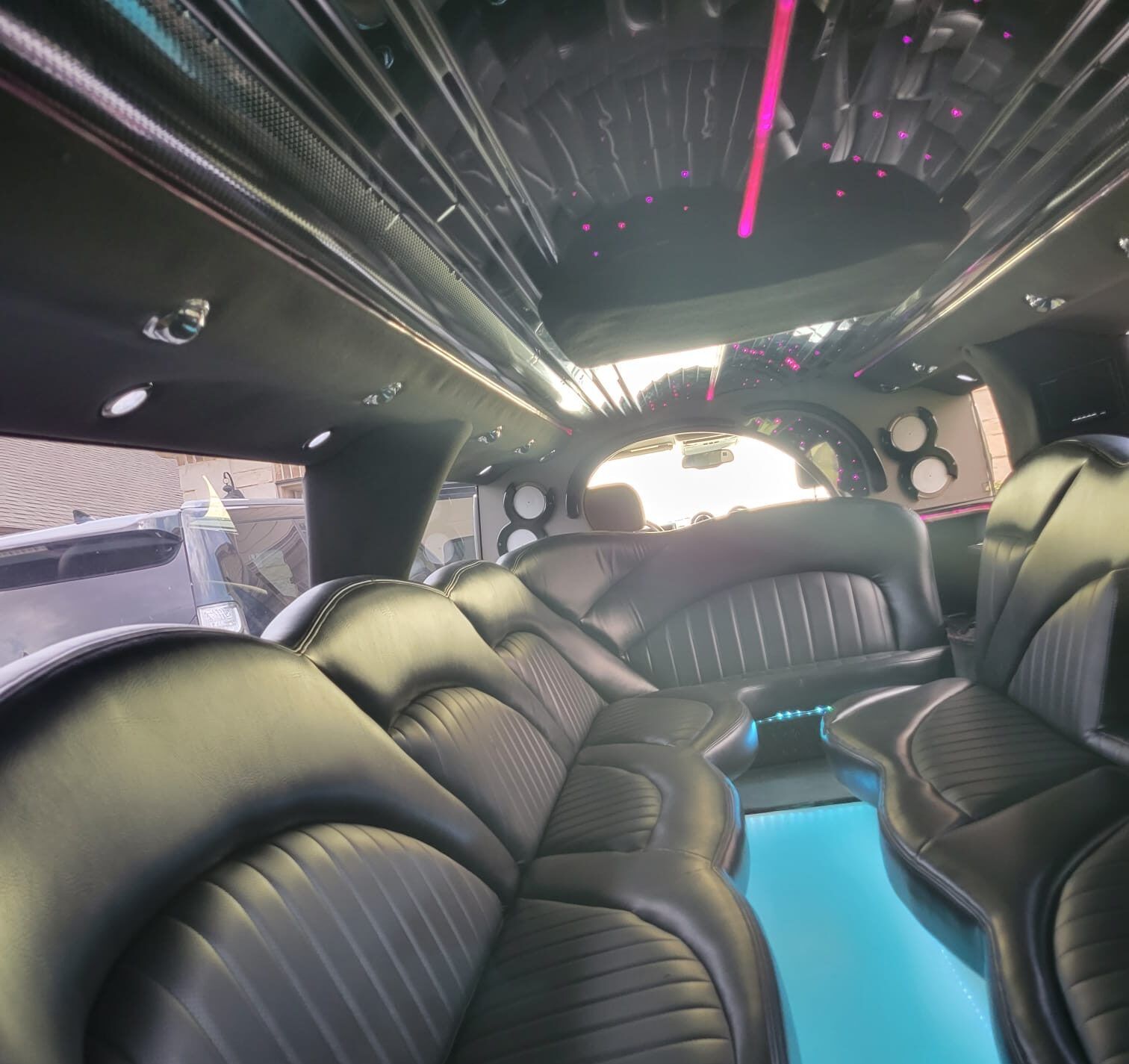 The inside of a limousine with the number 8 on the ceiling