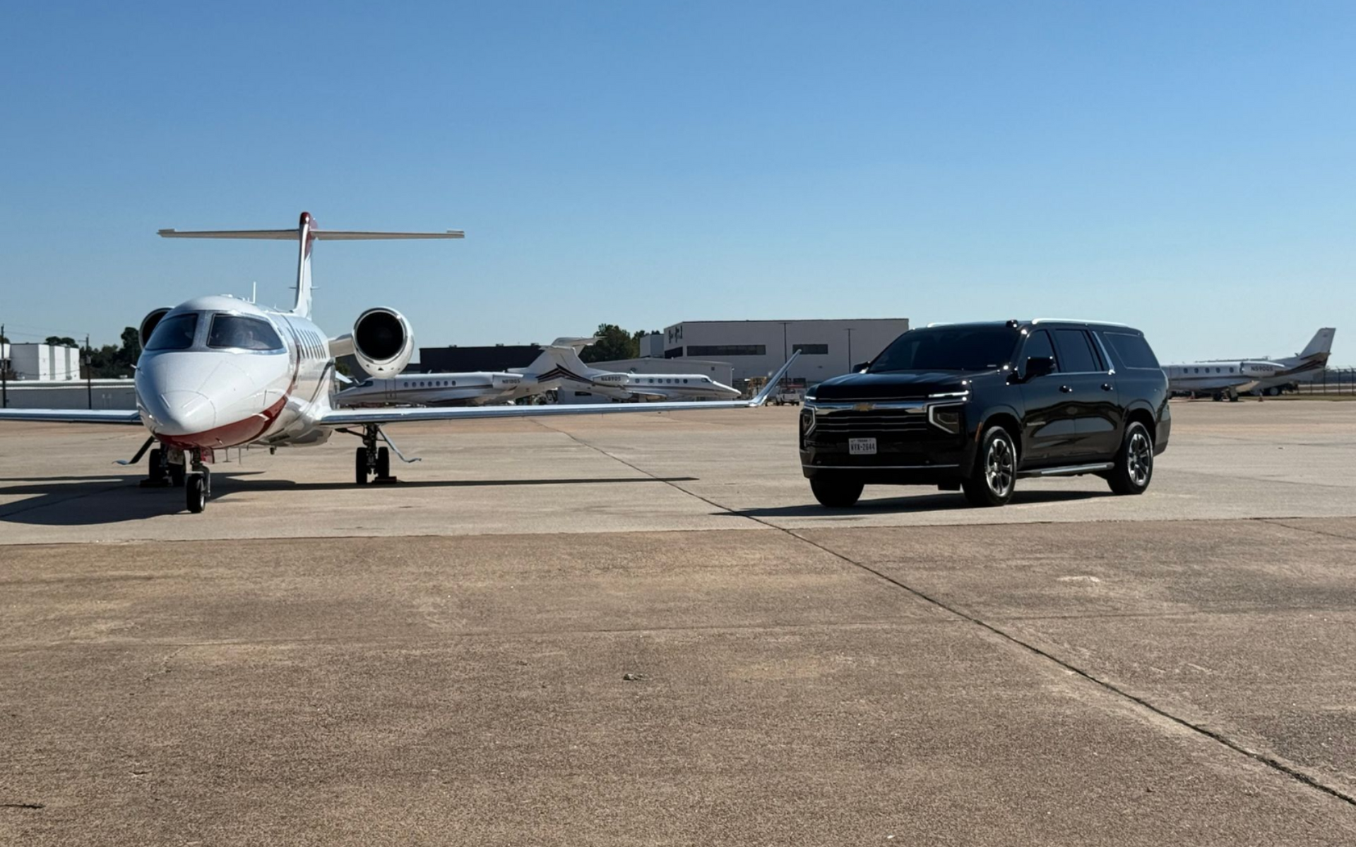 Professional chauffeur service Houston providing luxury black car transportation for executives.