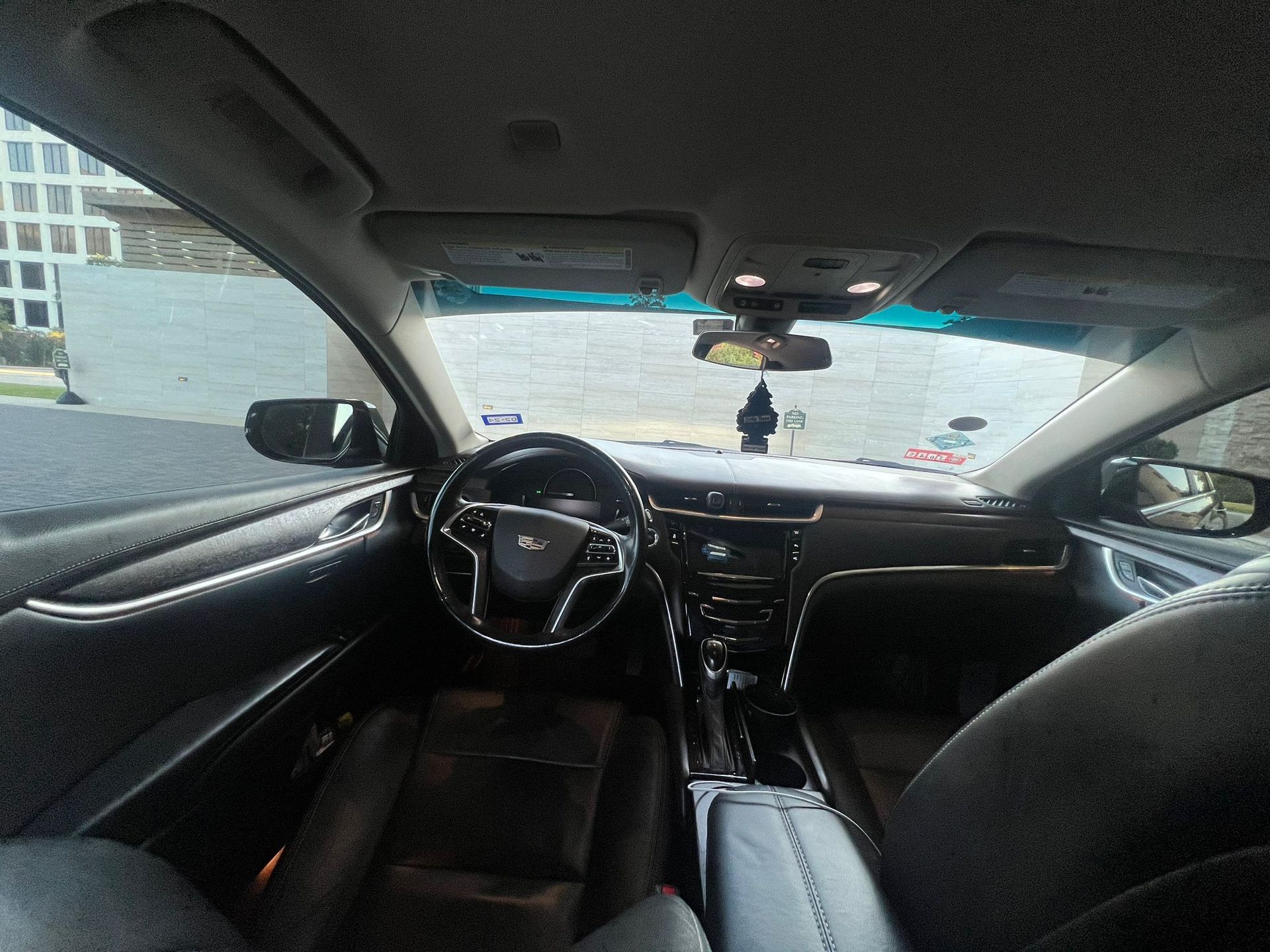 The inside of a car with a view of the ocean