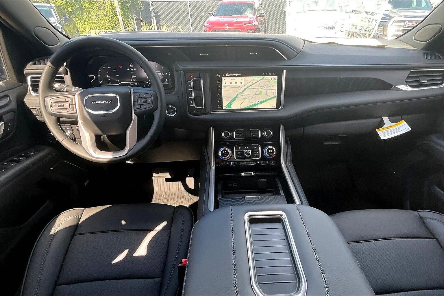 The interior of a gmc yukon is shown.