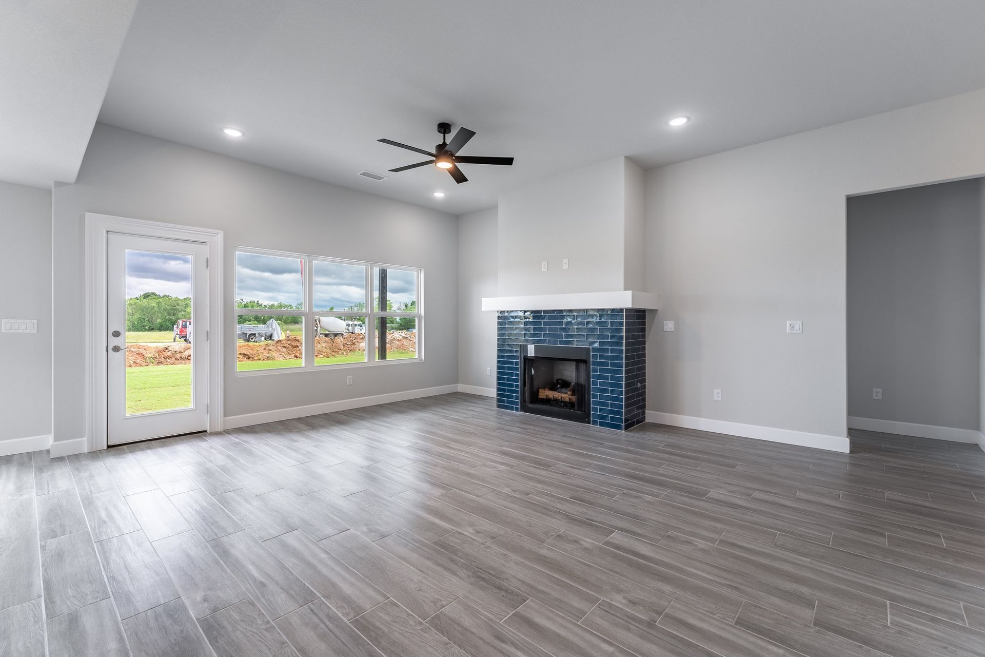 Beige Living Room Blue Mantle Fireplace House Home New Vision Real Estate NWA Arkansas