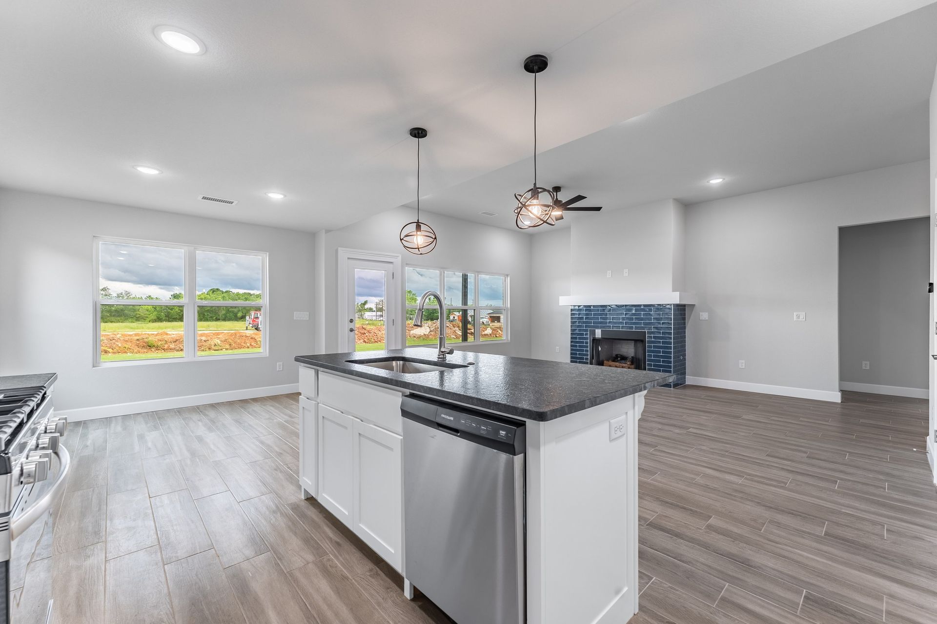 Kitchen Sink Fire Place Living Room House Home New Vision Real Estate NWA Arkansas