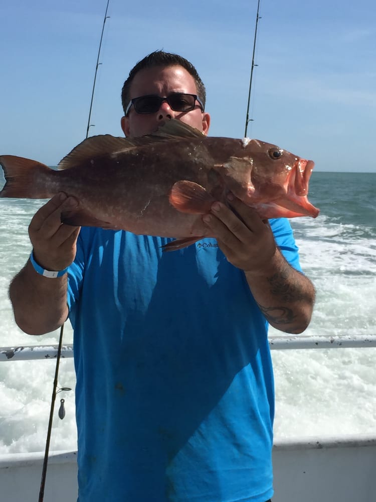 Man in Blue Shirt — Fort Myers, FL — Captain Tony’s Fishing Adventures