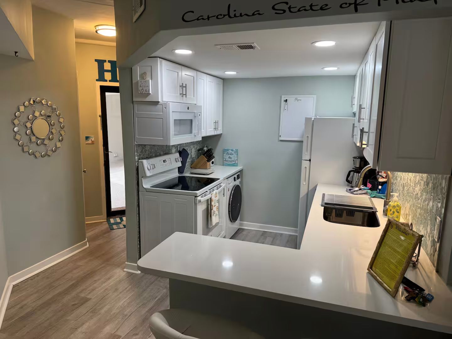 Enjoy family meals from this modern kitchen with all the appliances.