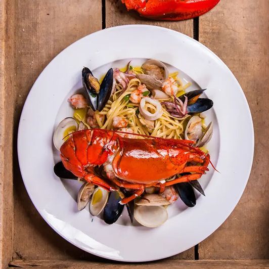 Seafood linguini with lobster and clams served at OMBRA Cucina.