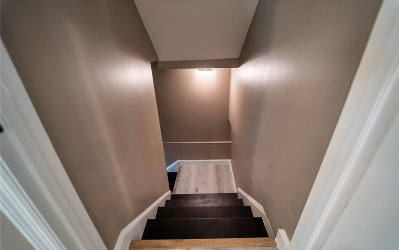 A staircase leading up to the second floor of a house