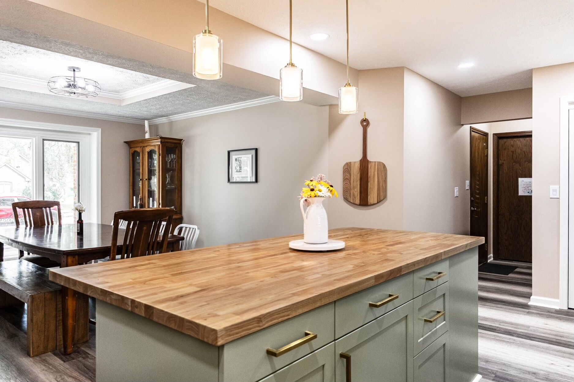 remodeled kitchen island with green drawer trim