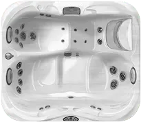 A white hot tub with a lot of jets on it.