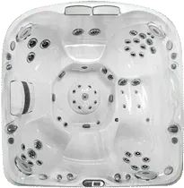 A white hot tub with a lot of bubbles on it.