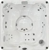 A white hot tub is sitting on top of a white surface.