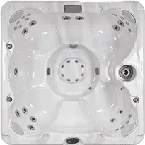 An aerial view of a white hot tub on a white background.