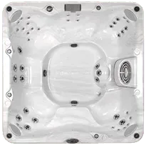 An aerial view of a white hot tub on a white background.